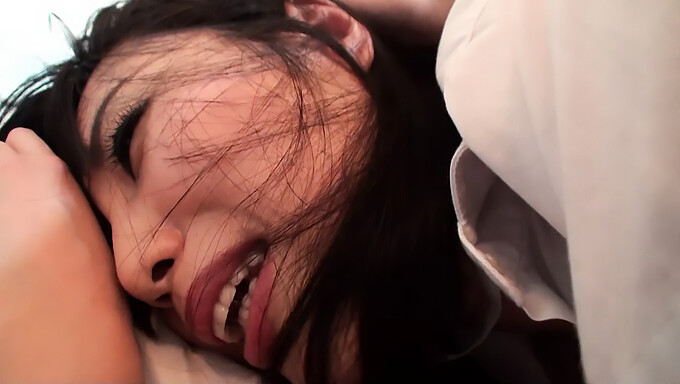 A Japanese Schoolgirl With Huge Breasts Is Seduced In A Hotel